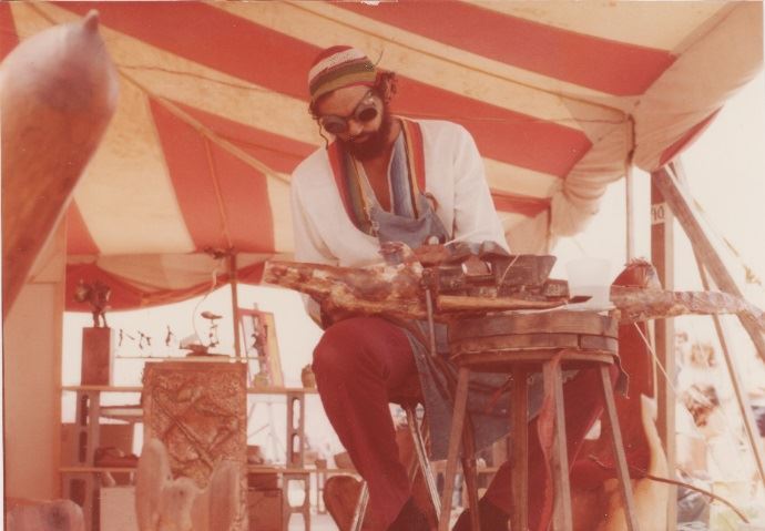 Ronald Trahan working on a sculpture.
