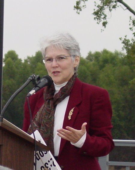 Woman giving a speech at the dedication